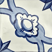 Tableau mural en azulejo « Fleur et étoiles »